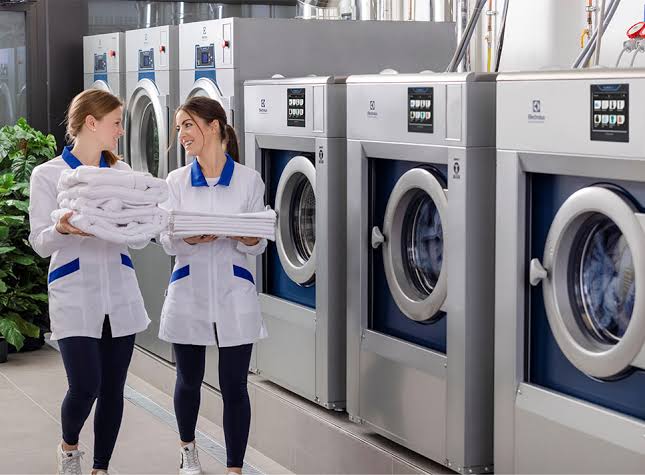 Quality control inspection of English Laundry garment stitching